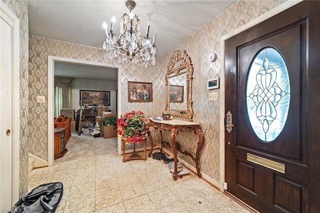 1204 Hobbs Rd, Greensboro, NC 27410 - entrance foyer with wallpapered walls, a chandelier, and tile patterned floors