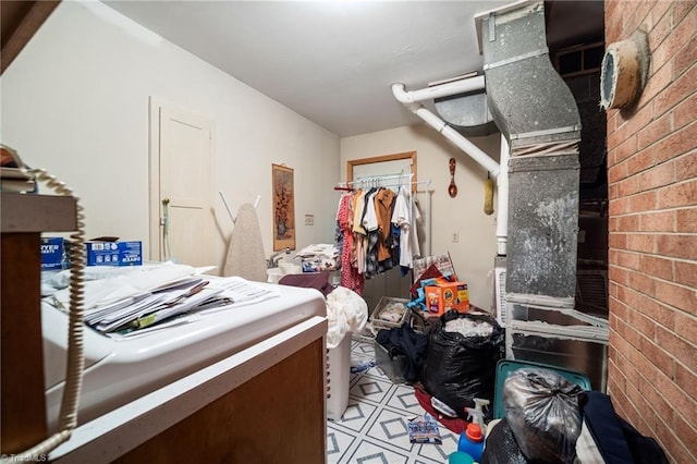 1204 Hobbs Rd, Greensboro, NC 27410 - misc room with brick wall