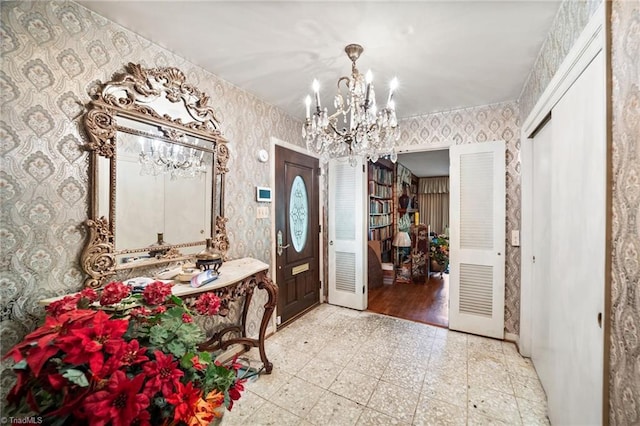 1204 Hobbs Rd, Greensboro, NC 27410 - foyer featuring wallpapered walls, a chandelier, and granite tiled floors