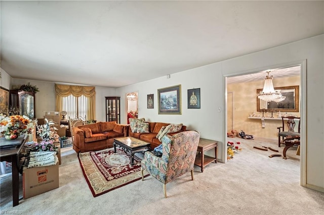1204 Hobbs Rd, Greensboro, NC 27410 - carpeted living room with a chandelier