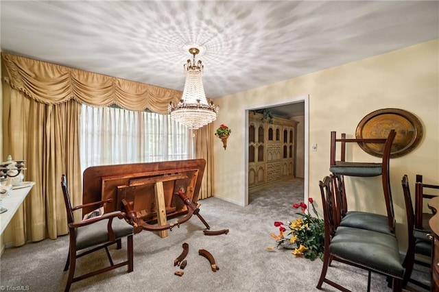 1204 Hobbs Rd, Greensboro, NC 27410 - carpeted dining area with a chandelier and baseboards