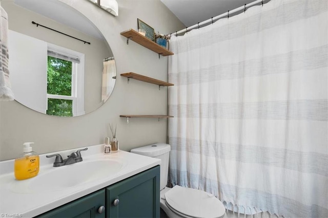 full bathroom featuring toilet and vanity