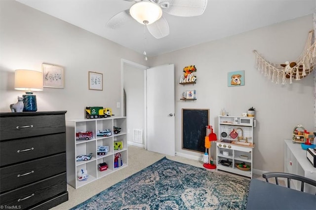 game room featuring carpet flooring, visible vents, baseboards, and ceiling fan