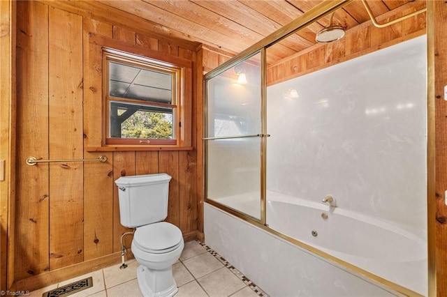 bathroom with tile patterned flooring, bath / shower combo with glass door, wood walls, and wood ceiling