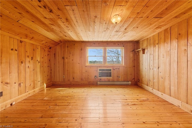 bonus room with wooden ceiling, baseboard heating, wooden walls, and an AC wall unit