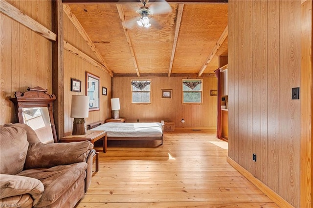 bedroom featuring wooden ceiling, wooden walls, and light hardwood / wood-style flooring