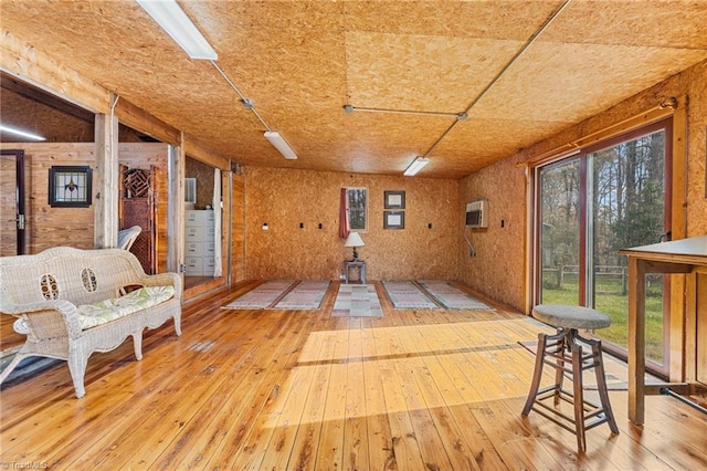 interior space with a wall mounted air conditioner