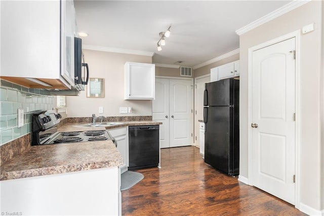 kitchen with dark hardwood / wood-style floors, black appliances, sink, crown molding, and white cabinetry