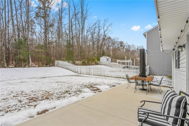 view of snow covered patio