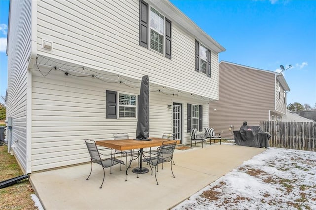 rear view of house featuring a patio