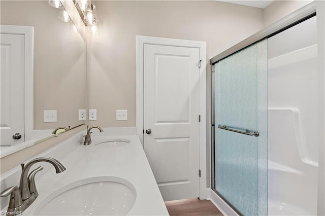 bathroom featuring vanity and walk in shower