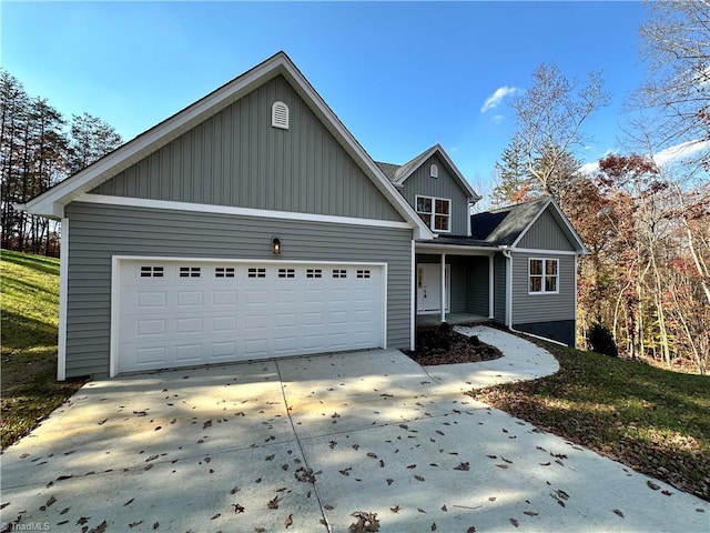 front of property with a garage