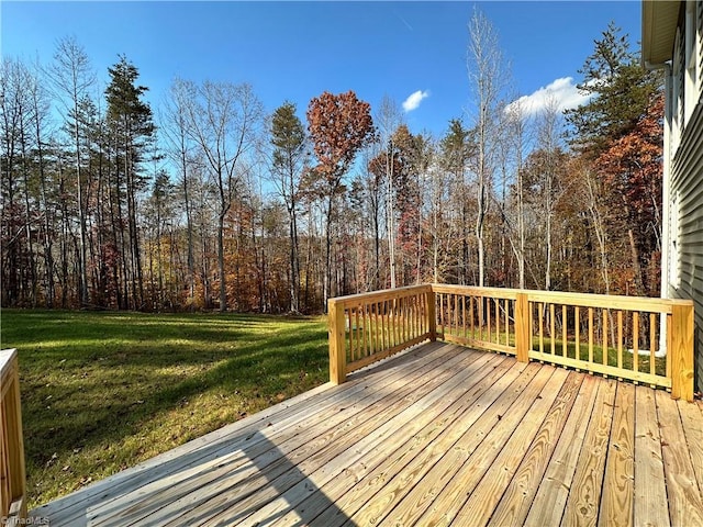 deck featuring a lawn