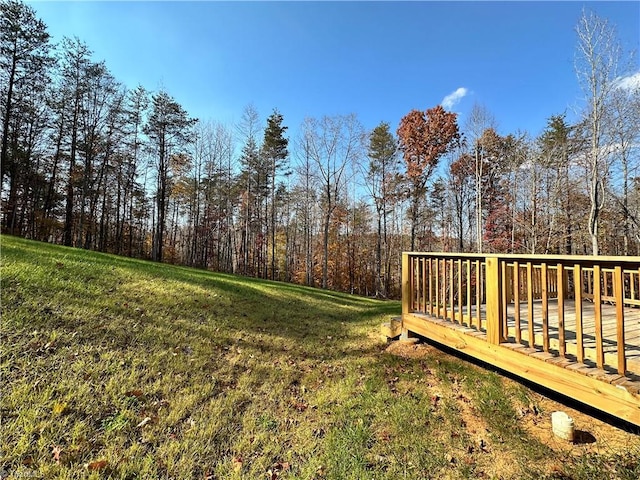 view of yard with a wooden deck