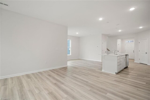 5365 Roshni Ter, Mcleansville, NC 27301 - kitchen featuring visible vents, baseboards, light wood-type flooring, and recessed lighting