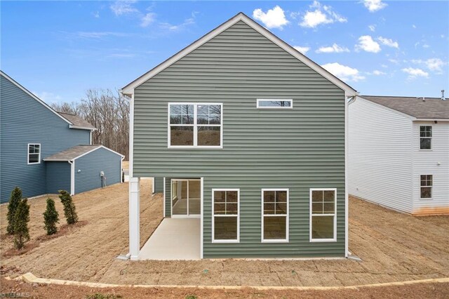 5365 Roshni Ter, Mcleansville, NC 27301 - back of property featuring a patio