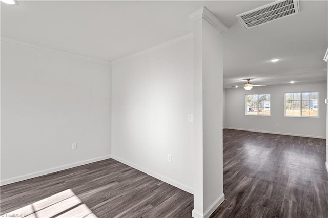 unfurnished room featuring visible vents, baseboards, recessed lighting, and dark wood-style floors