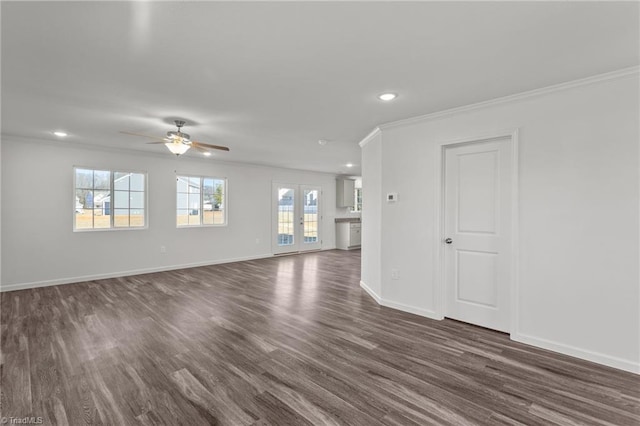 unfurnished living room featuring baseboards, dark wood-style flooring, ornamental molding, ceiling fan, and recessed lighting