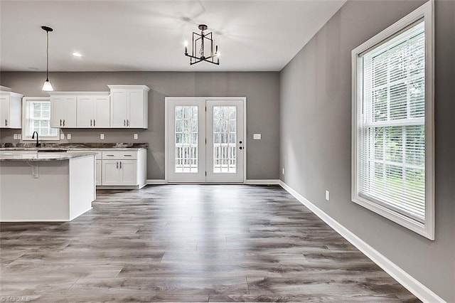 307 Lick Creek Church Rd, Denton, NC 27239 - kitchen with white cabinets, a chandelier, decorative light fixtures, dark wood finished floors, and recessed lighting