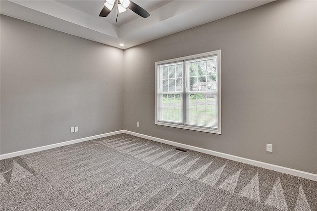 307 Lick Creek Church Rd, Denton, NC 27239 - spare room featuring carpet flooring, ceiling fan, baseboards, recessed lighting, and a raised ceiling