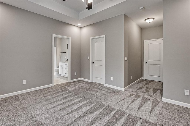 307 Lick Creek Church Rd, Denton, NC 27239 - unfurnished bedroom featuring carpet flooring, ensuite bathroom, baseboards, and ceiling fan