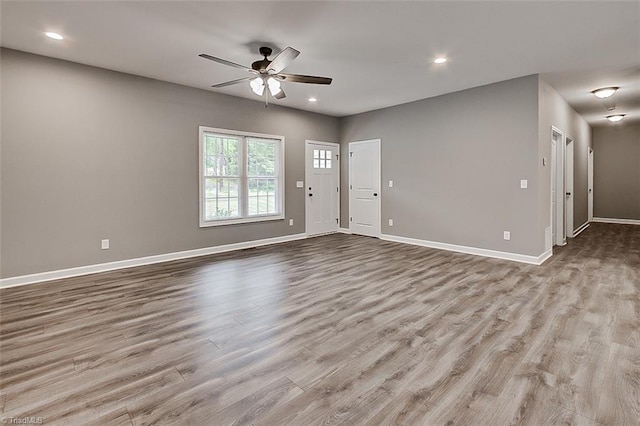 307 Lick Creek Church Rd, Denton, NC 27239 - unfurnished living room with ceiling fan, wood finished floors, baseboards, and recessed lighting