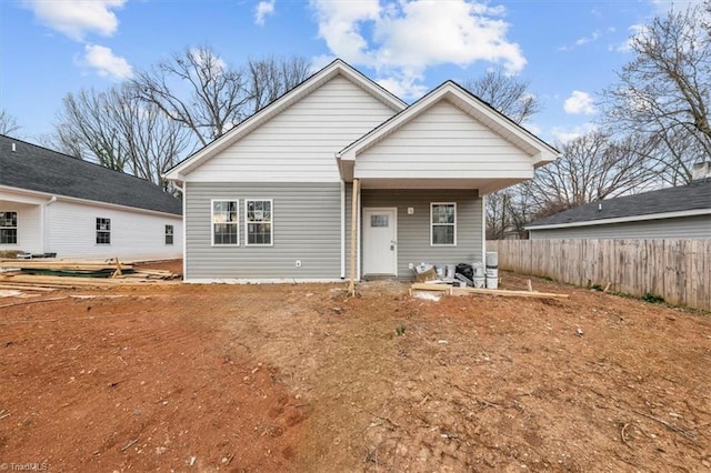 view of front of home with fence