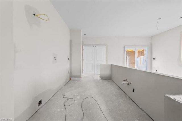 bathroom with unfinished concrete floors