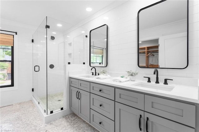 306 W Greenway Dr S, Greensboro, NC 27403 - full bathroom featuring crown molding, a stall shower, double vanity, and recessed lighting
