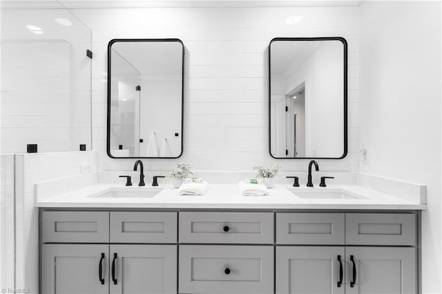 306 W Greenway Dr S, Greensboro, NC 27403 - full bathroom featuring double vanity and crown molding