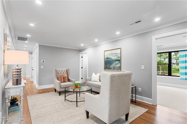 306 W Greenway Dr S, Greensboro, NC 27403 - living area with ornamental molding, recessed lighting, wood finished floors, and baseboards