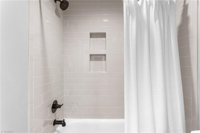 306 W Greenway Dr S, Greensboro, NC 27403 - bathroom featuring shower / tub combo with curtain