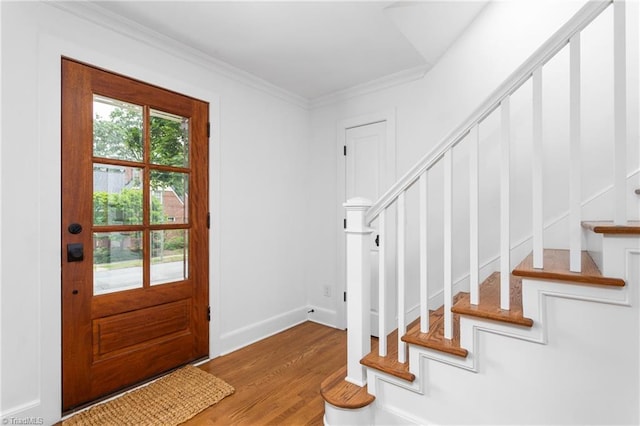 306 W Greenway Dr S, Greensboro, NC 27403 - entryway with stairs, wood finished floors, ornamental molding, and baseboards