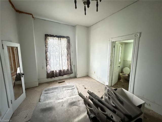 bedroom featuring ensuite bathroom