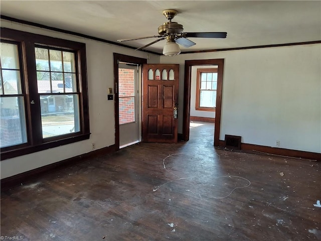 entryway featuring crown molding and ceiling fan