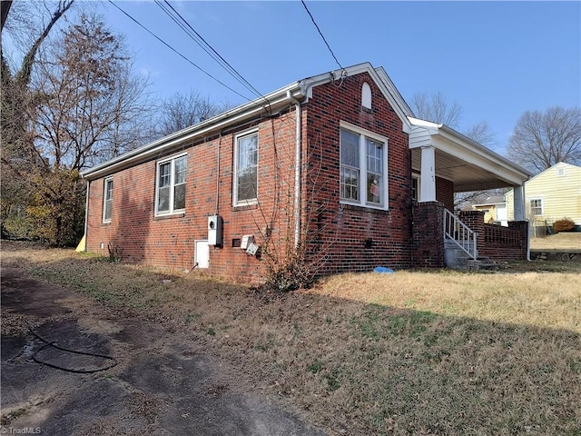 view of property exterior featuring a yard