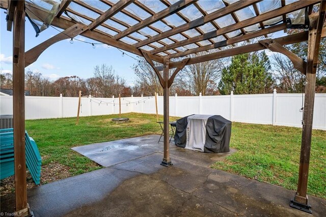 view of patio with a pergola and grilling area