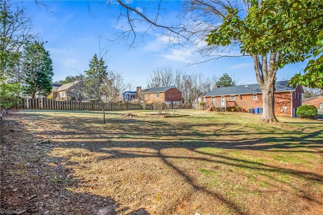 view of yard featuring fence