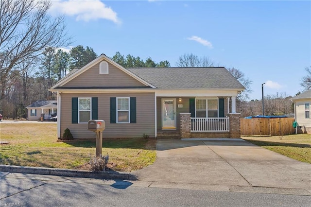 view of front of house featuring a porch and a front yard