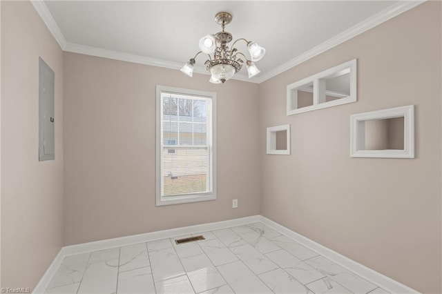 empty room featuring crown molding, marble finish floor, visible vents, and baseboards