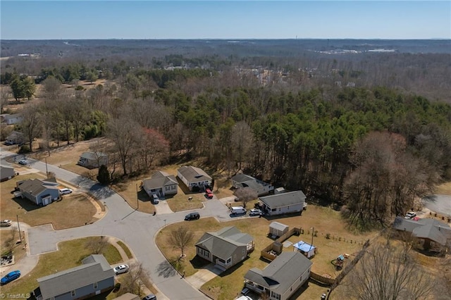 bird's eye view with a forest view