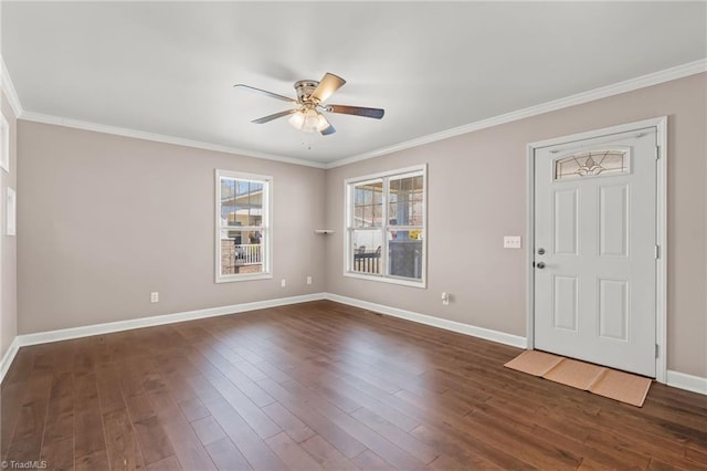 entrance foyer with baseboards, dark wood-style flooring, and ornamental molding