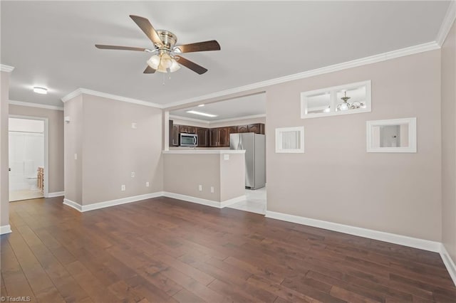 unfurnished living room featuring a ceiling fan, dark wood-style flooring, crown molding, and baseboards