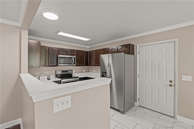 kitchen with marble finish floor, light countertops, appliances with stainless steel finishes, dark brown cabinetry, and a peninsula