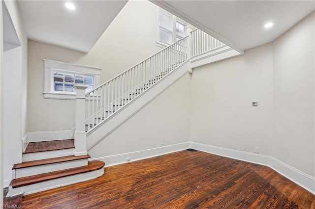 stairs with wood-type flooring