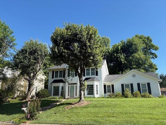 3600 Cardinal Ridge Dr, Greensboro, NC 27410 - view of front of house with a front lawn