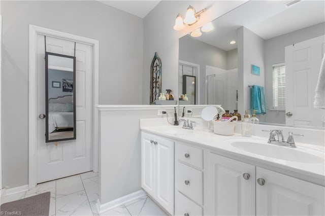 bathroom with vanity and an enclosed shower