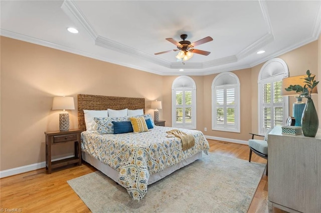 142 Covington Pl, Lewisville, NC 27023 - bedroom with a tray ceiling, ornamental molding, light wood-style floors, recessed lighting, and ceiling fan