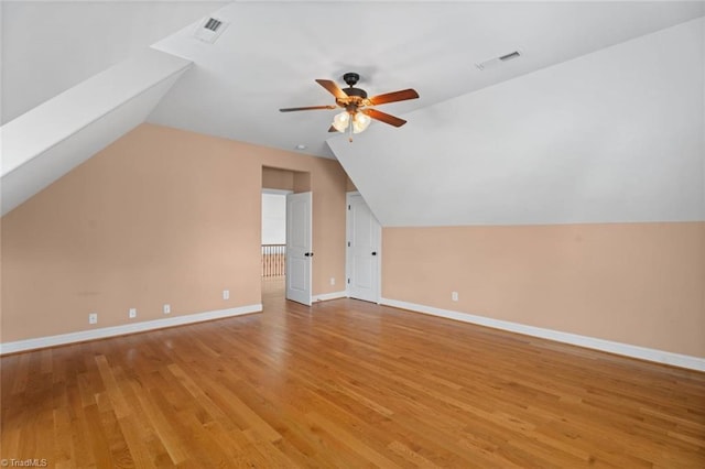 142 Covington Pl, Lewisville, NC 27023 - additional living space with ceiling fan, vaulted ceiling, and light wood finished floors