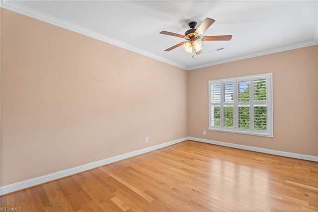 142 Covington Pl, Lewisville, NC 27023 - spare room with light wood-style flooring, crown molding, and a ceiling fan